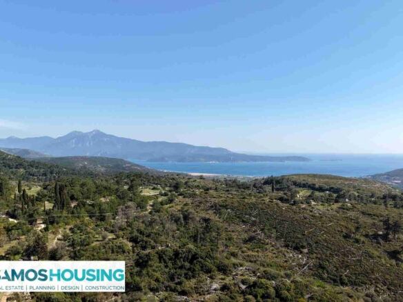 View over green hills to the sea from the land in Zervou, Samos