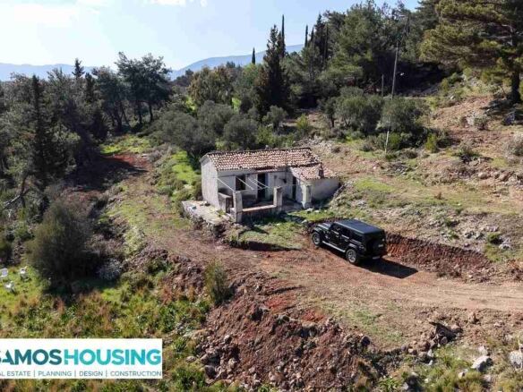Dirt track leading to the stone cottage in Zervou, Samos
