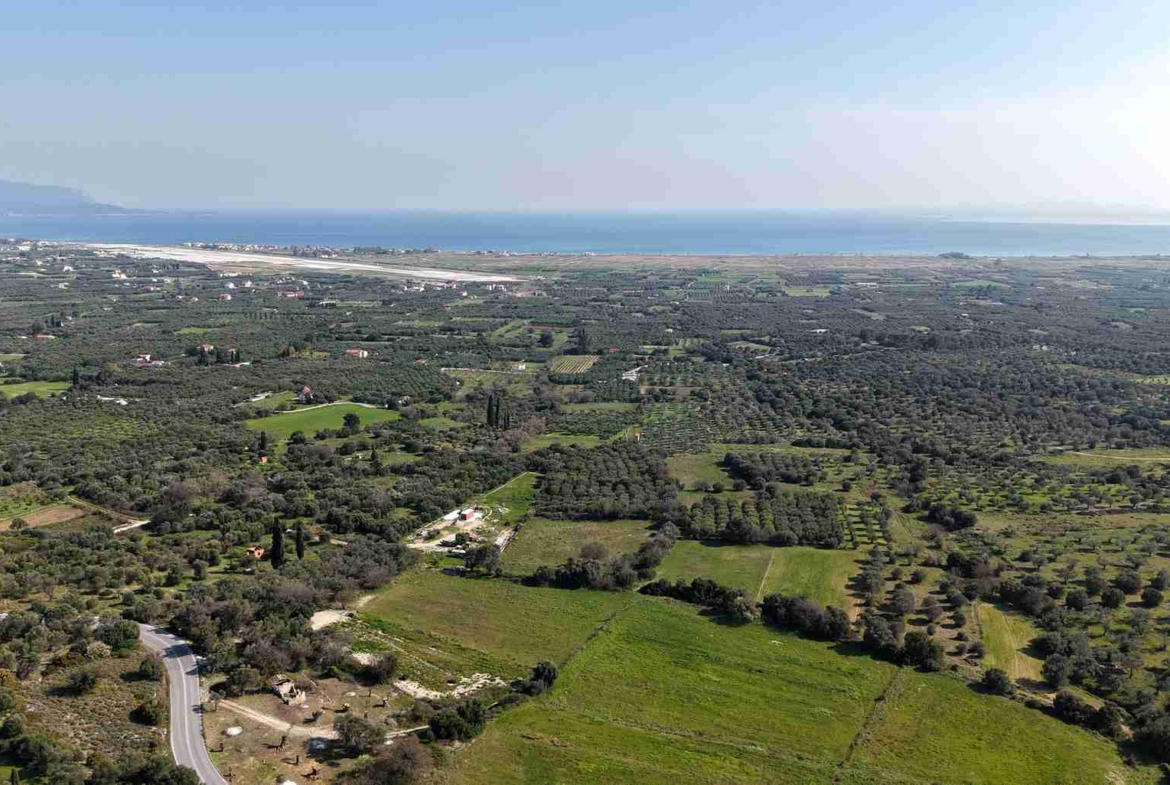 Hillside rural land near Chora Samos overlooking Potokaki beach and Aegean sea SH578