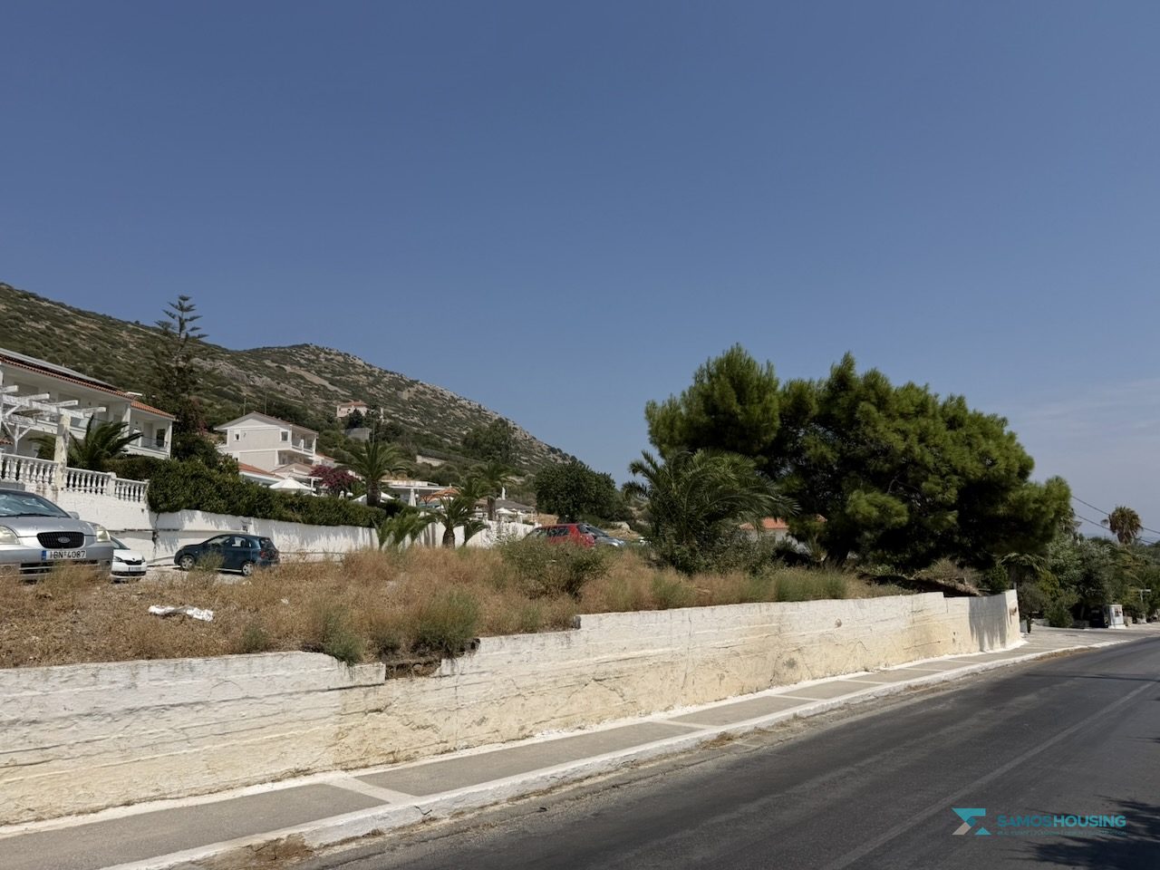 SH591 Land Pythagorio Samos 18 Paved road, pavement and boundary wall at the parcel edge, Samos