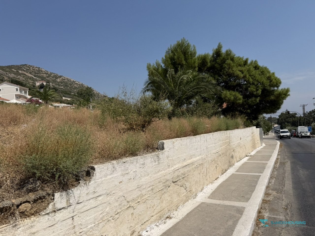SH591 Land Pythagorio Samos 21 Retaining wall running the length of the road frontage, Pythagorio Samos