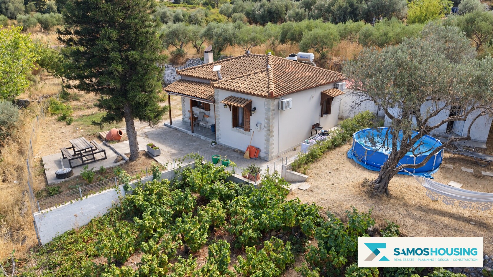 Tiled-roof house surrounded by trees