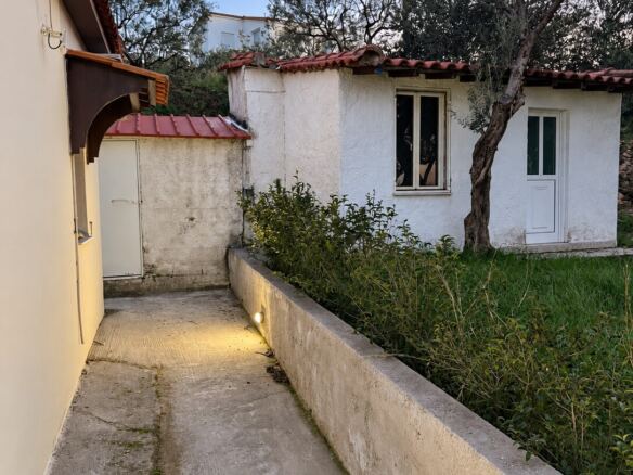 Paved passage beside the house