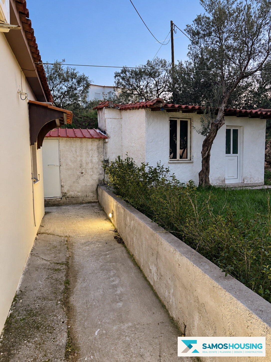 Paved passage beside the house