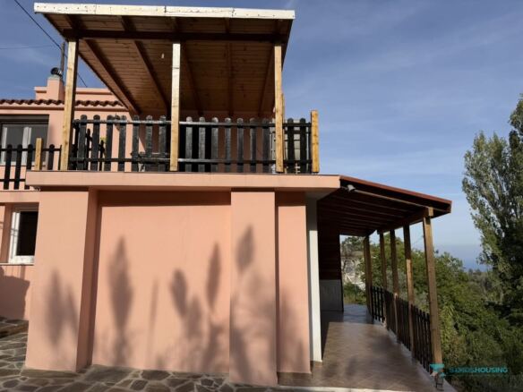 Ground-floor facade and side covered terrace of the house, Stavrinides