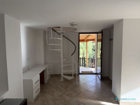 Hall opening onto the covered terrace and trees, Stavrinides cottage