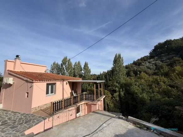 Side view of the house above the forest, Stavrinides village, Samos