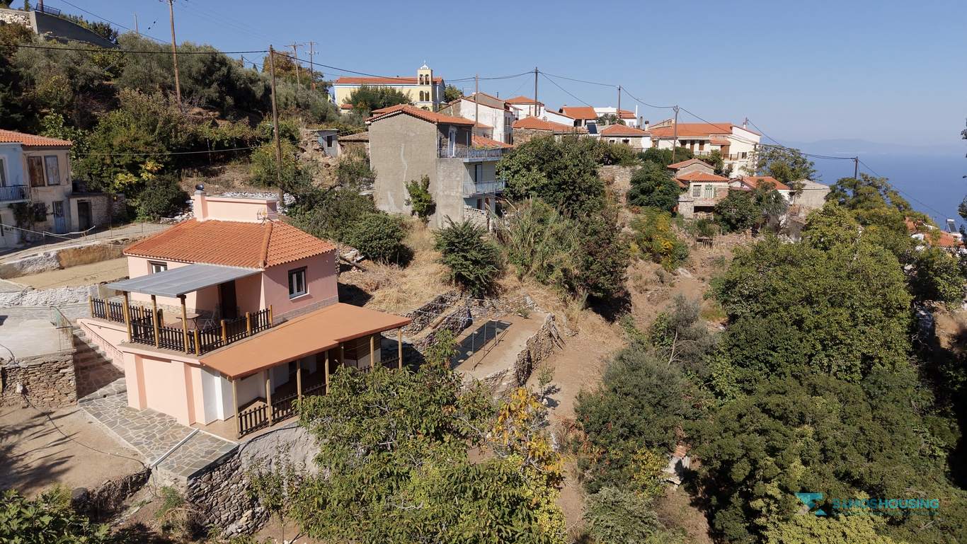 Cottage for sale in Stavrinides Samos, aerial view with the village and the Aegean