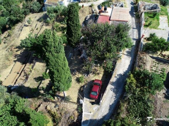 Drone view of the terraces sloping west from the road